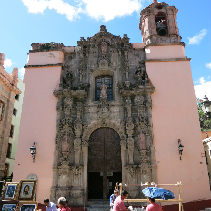 The facade of the Church of San Diego is decorated in a style known as Churriguresque